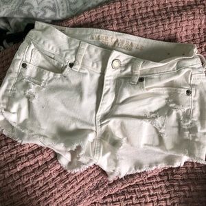 distressed white shorts
